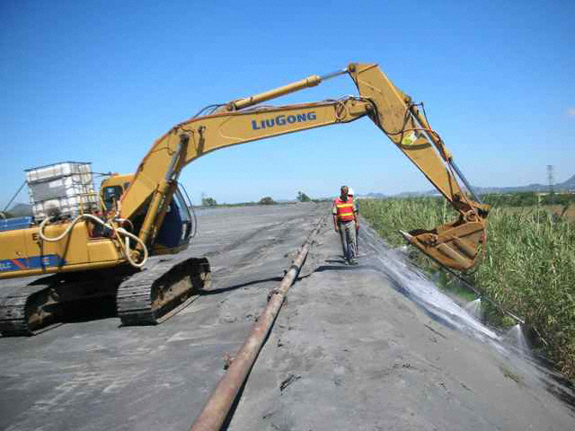 Mine tailings dust control